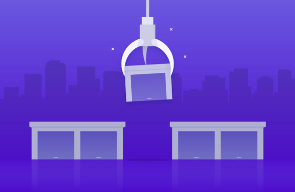 A robotic claw suspends a box above two tables against a purple cityscape background.