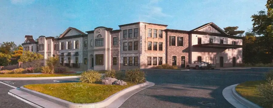 A building with a lot of grass.