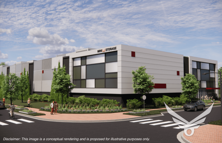 A modern, multi-story storage facility with a white and gray exterior is bordered by greenery. A car is parked near the entrance, and a person is walking on the sidewalk.