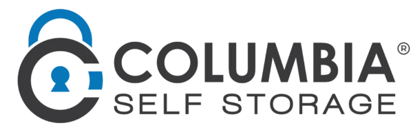 Logo of Columbia Self Storage with a padlock icon on the left, featuring a person silhouette inside a lock design. The text "Columbia Self Storage" is written in bold, dark letters.