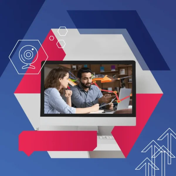 A man and woman sit at a desk discussing work in front of a computer monitor, with geometric shapes and icons overlaid on a blue background.