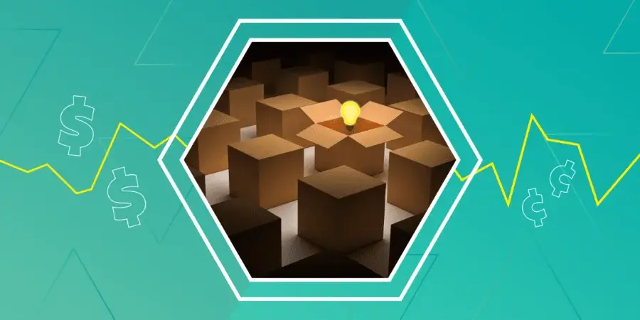 A glowing light bulb sits on an open cardboard box among closed boxes, symbolizing innovation or creative ideas amid uniformity.